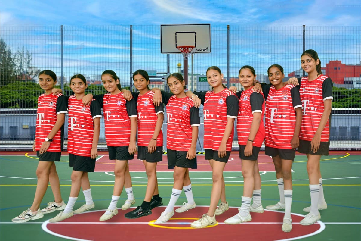 Students developing teamwork through sports